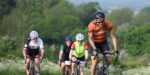 Supporters cycling in Cycle St Giles