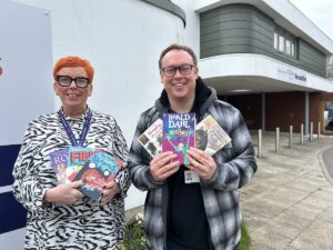 St Giles Hospice retail team preparing children’s books ahead of World Book Day celebrations.