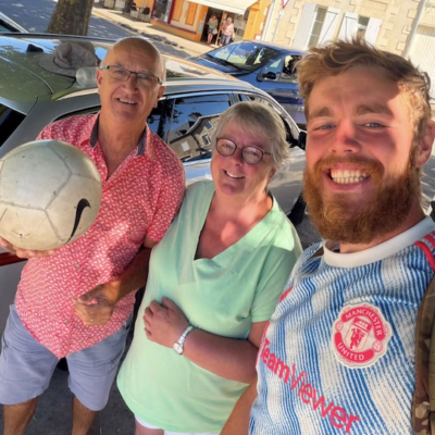 James Lewis, a 26-year-old football coach from Rugeley, pictured with French couple Tricia Sevellec and Jean-Pierre, who opened their home to him during his 2,000-mile fundraising challenge for St Giles Hospice.
