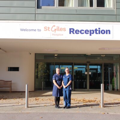 Ruth Abell and Samantha Doody standing side by side in front of St Giles Hospice